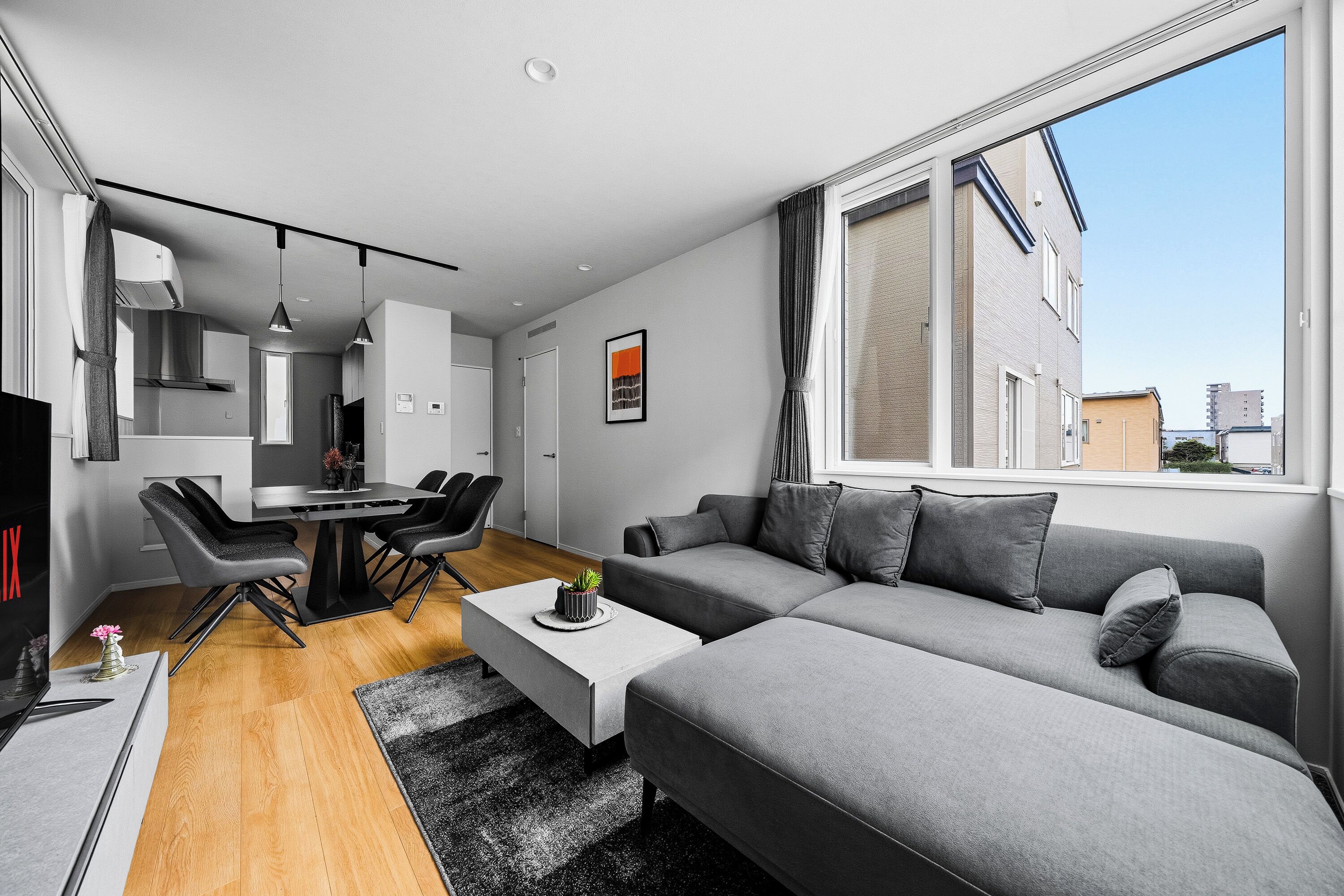 Apartment | Living area | 50-inch flat-screen TV with digital channels