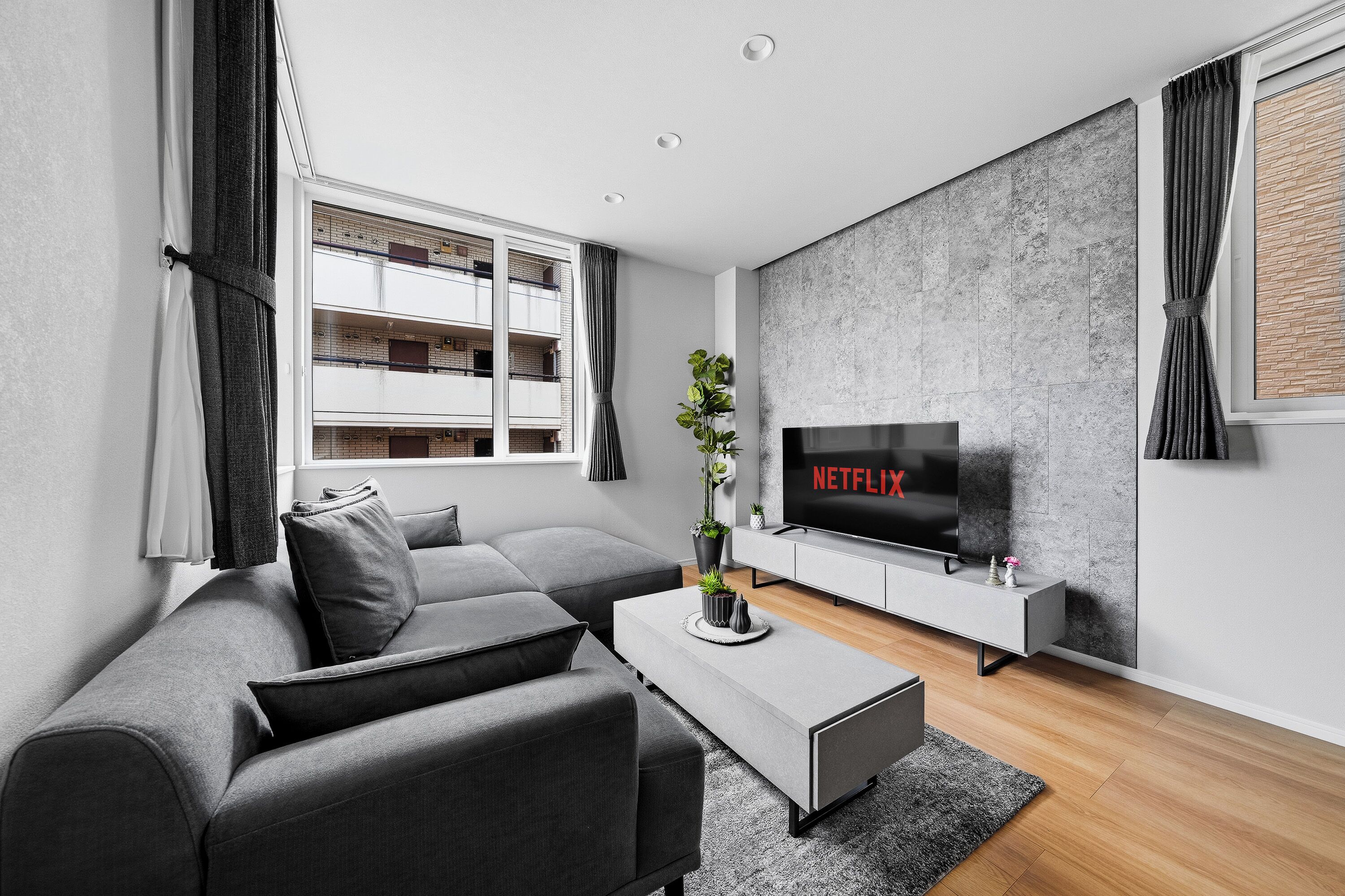 Apartment | Living area | 50-inch flat-screen TV with digital channels