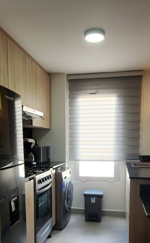 Private kitchen - Luxurious 2 Bedroom Apartment With Pool View in Punta Cana (Punta Cana)
