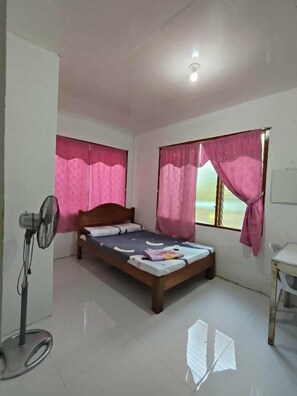 Unclassified image, 5 of 80, button - RGR CAMIGUIN TRAVEL AND PENSION HOUSE (Mambajao)