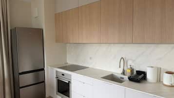 Deluxe Apartment, Balcony | Private kitchen