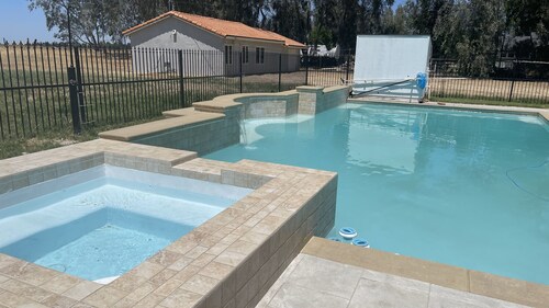 5145 Golf Rd, ADU, 40K Gallon pool on 60K SF land. Merced’s most exclusive area.