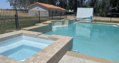 5145 Golf Rd, ADU, 40K Gallon pool on 60K SF land. Merced’s most exclusive area.