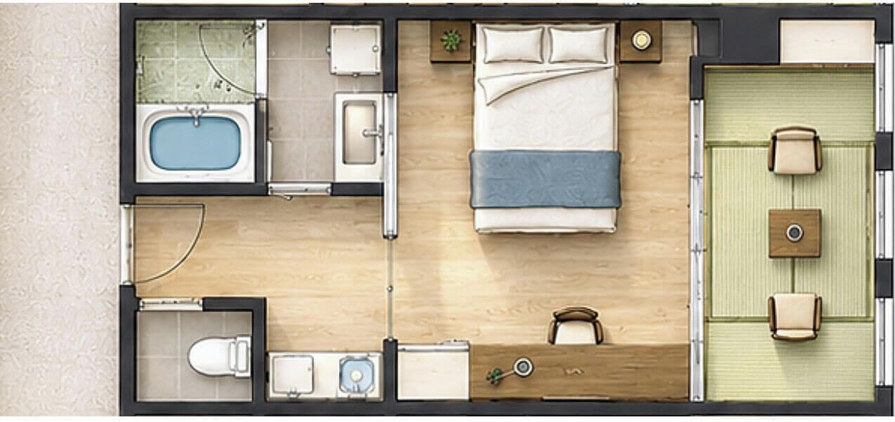 Plànol d'una habitació d'hotel que mostra un llit, un bany, zona de seients i una cuineta petita.