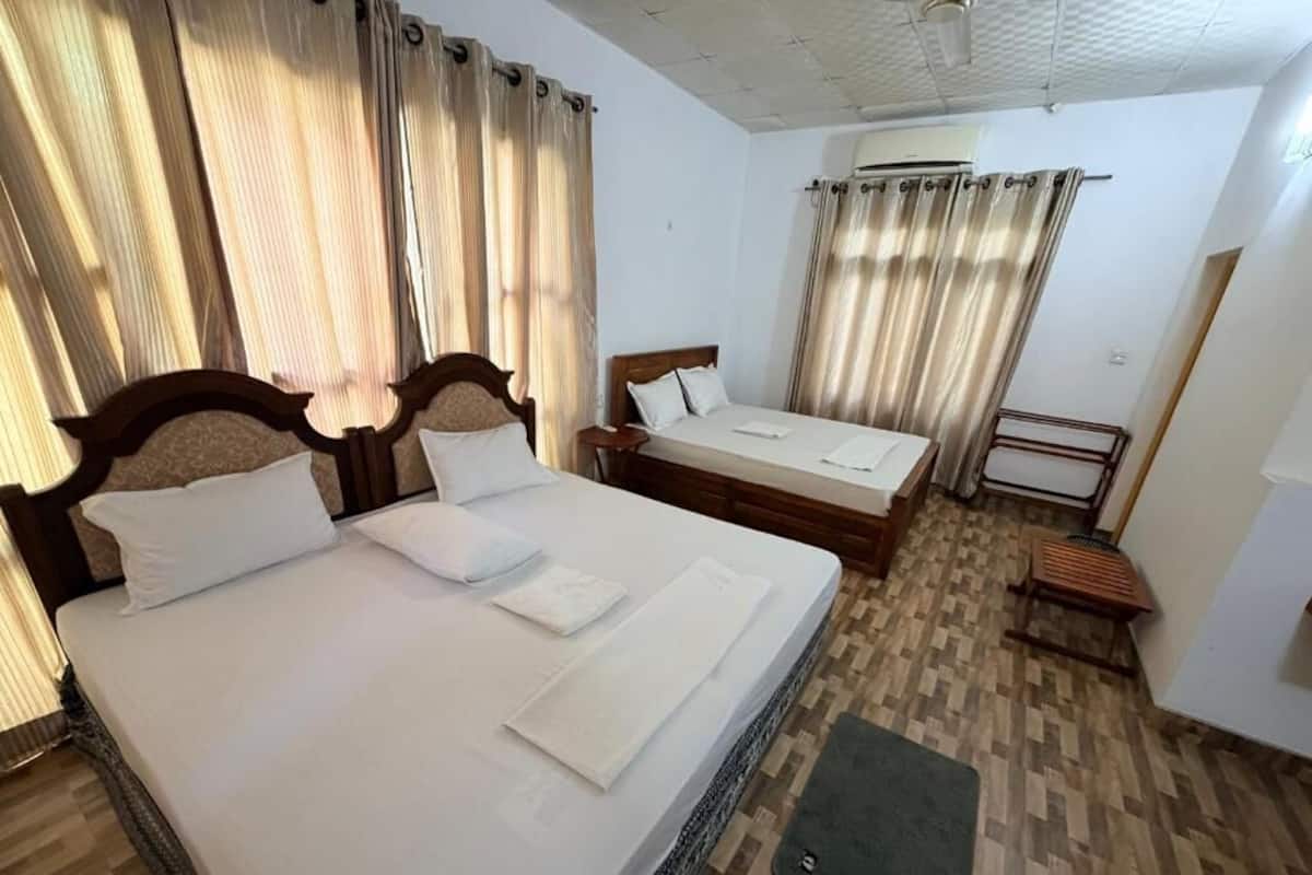 Family Room, Patio, Courtyard View | In-room safe, desk, laptop workspace, iron/ironing board