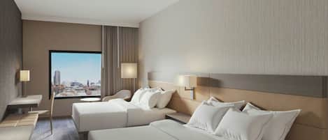 A hotel room with two beds, a desk, and a view of the city.