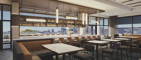Eine moderne Bar mit Sitzgelegenheiten und Blick auf die Stadt.