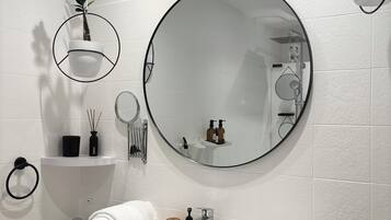 Hair dryer, towels, soap, toilet paper