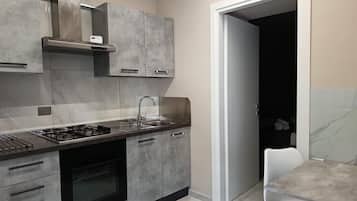 Refrigerador, horno, placa de cocina, cafetera/tetera