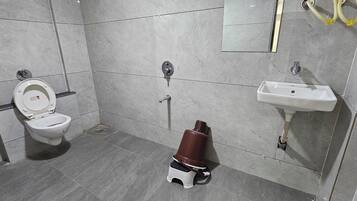 Deluxe Double Room, City View | Bathroom | Free toiletries, slippers, towels, soap