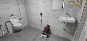 Deluxe Double Room, City View | Bathroom | Free toiletries, slippers, towels, soap - HOTEL APEX INN (Mahemdavad)