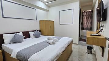 Deluxe Double Room, City View | In-room safe, desk, laptop workspace, free WiFi