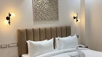 Deluxe Room, Balcony | Desk, laptop workspace, free WiFi