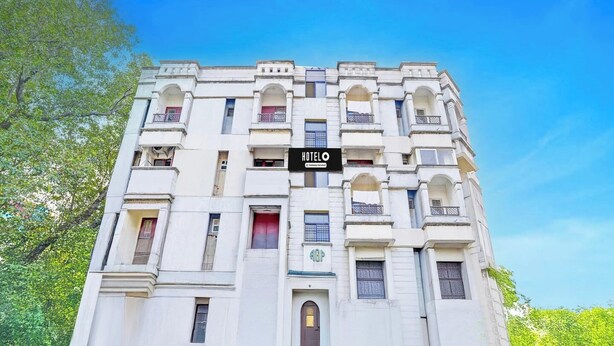 A multi-story hotel building with a prominent 'HOTEL' sign on the facade. - Classic Agp Home Stay (Chennai)