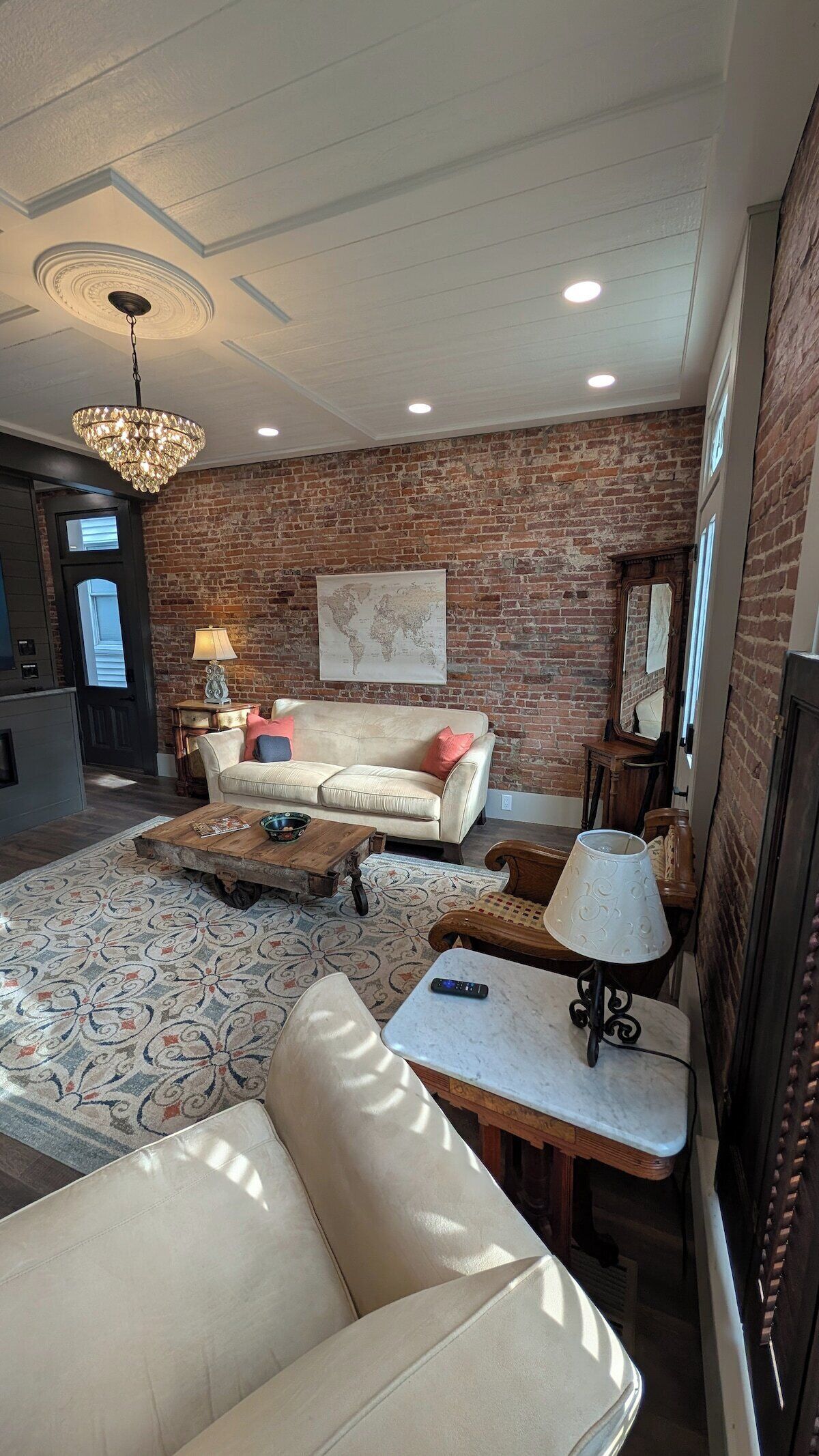 TV, fireplace, books
