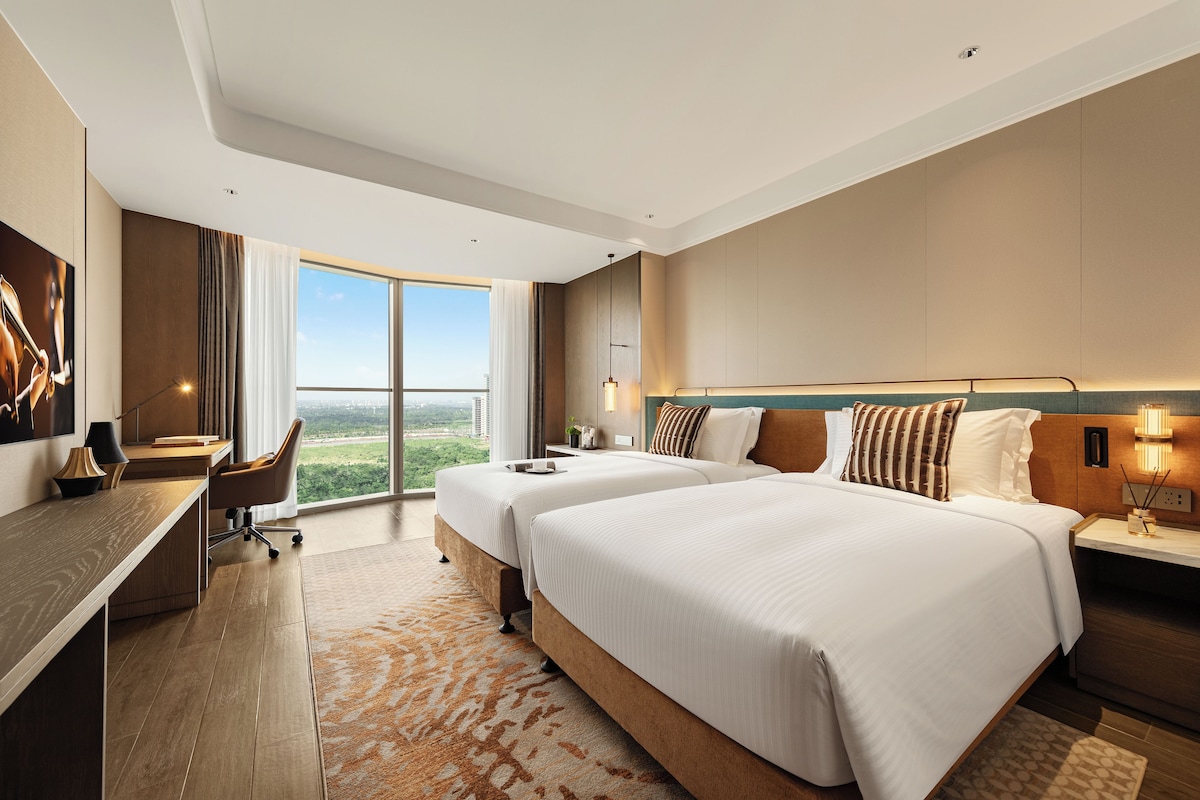Studio Executive, 2 giường đơn | Chăn bông, két bảo mật tại phòng, màn/rèm cản sáng, phòng cách âm 