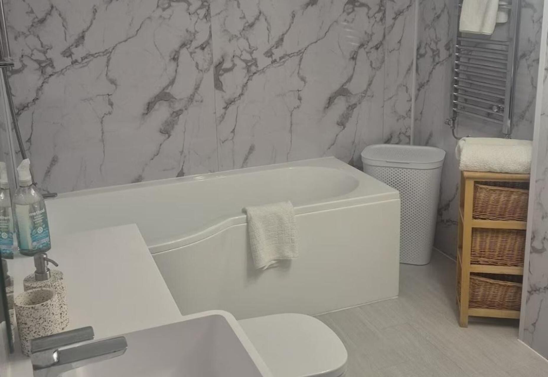 Combined shower/bathtub, deep-soaking bathtub, towels