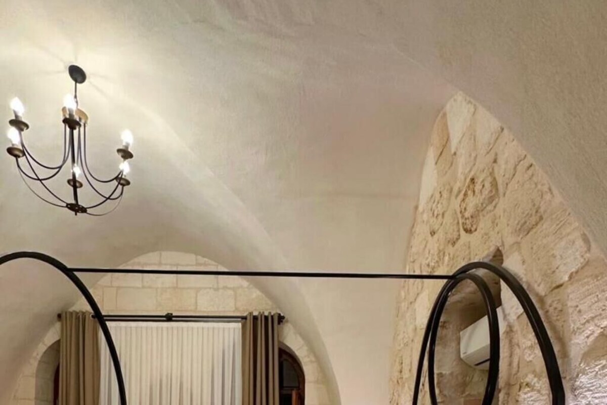 Quarto luxo, vista para a cidade | Wi-Fi de cortesia, individualmente decorados, roupa de cama