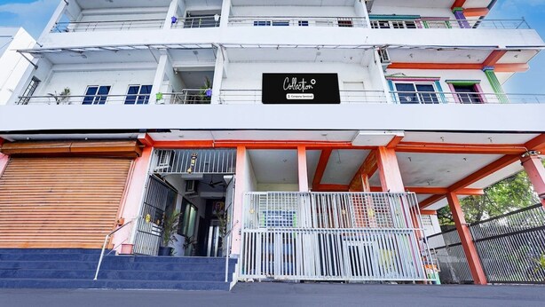 A multi-story building with a sign reading 'Collection.' - Deluxe Collection O Mahabalipuram (Tirukalukundram)