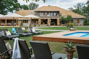 Outdoor pool, pool umbrellas, sun loungers
