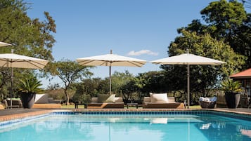 Outdoor pool, pool umbrellas, pool loungers