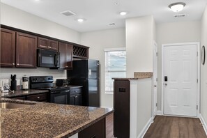 Coffee/tea maker, fridge, microwave, oven - Cozy 2BR Stay with Modern Comforts (Savannah)