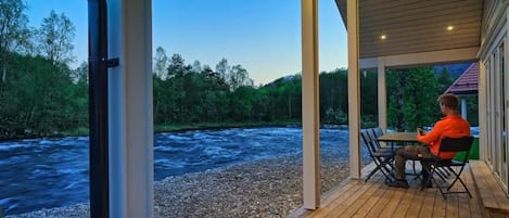 Premium Cabin, River View | Outdoor dining