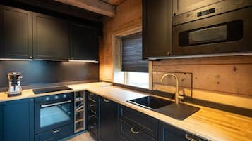 Premium Cottage, Resort View | Private kitchen | Highchair