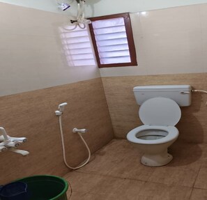 Deluxe Room | Bathroom | Shower, free toiletries, towels - DP Residency (Chennai)