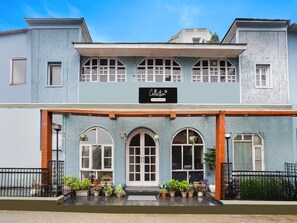 A two-story building with a sign reading 'Collection.' - Classic Villa Barlow (Dehradun)
