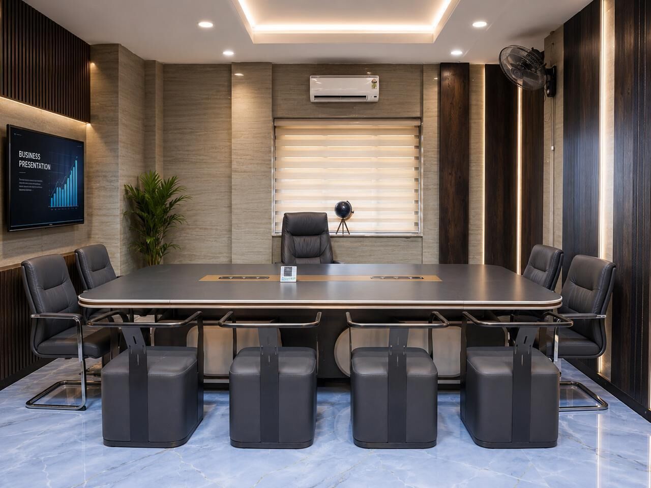 A conference room with a long table, six chairs, a projector screen, and an air conditioning unit.
