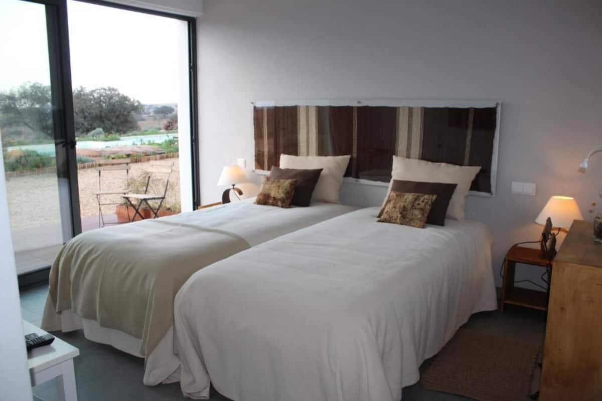 Double or Twin Room, Patio, Pool View | Laptop workspace, soundproofing, iron/ironing board (on request)