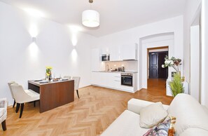 Deluxe Apartment, 2 Bedrooms, Non Smoking, City View | Living area - Kora Premiere Collection (Hlavní město Praha)