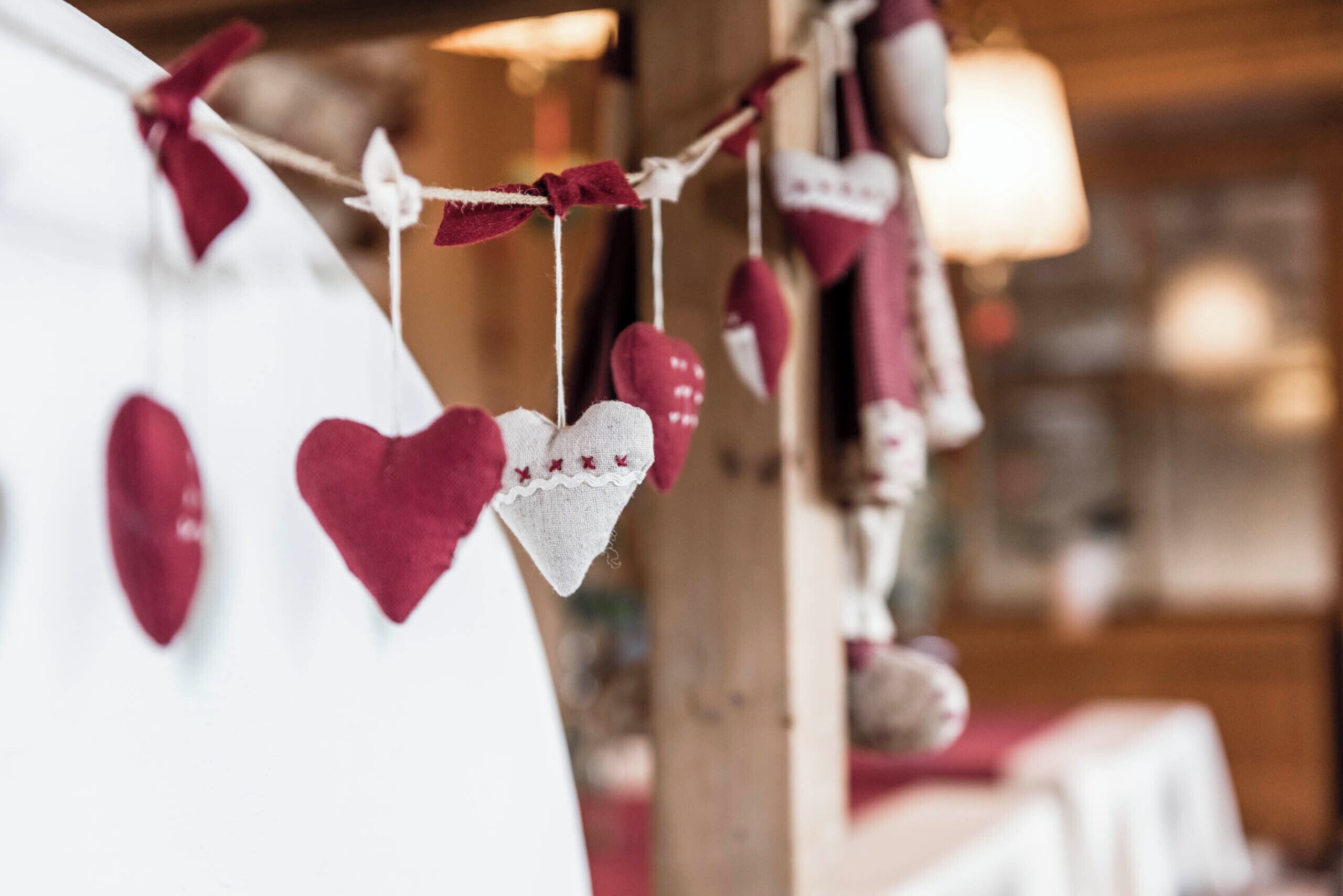A wall with heart-shaped decorations.