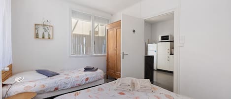 2 室のベッドルーム、アイロン / アイロン台、WiFi、ベッドシーツ