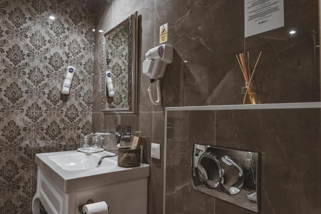 Hair dryer, slippers, towels, soap