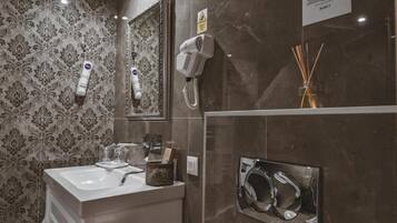 Hair dryer, slippers, towels, soap