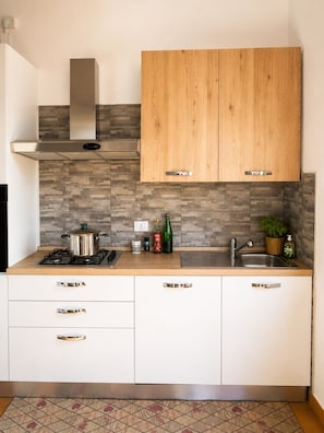 Private kitchen - Perla Ionica Beachfront Apartment with Private Parking in Giardini Naxos, Sicily (Giardini Naxos)