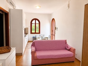 Living area - Perla Ionica Beachfront Apartment with Private Parking in Giardini Naxos, Sicily (Giardini Naxos)