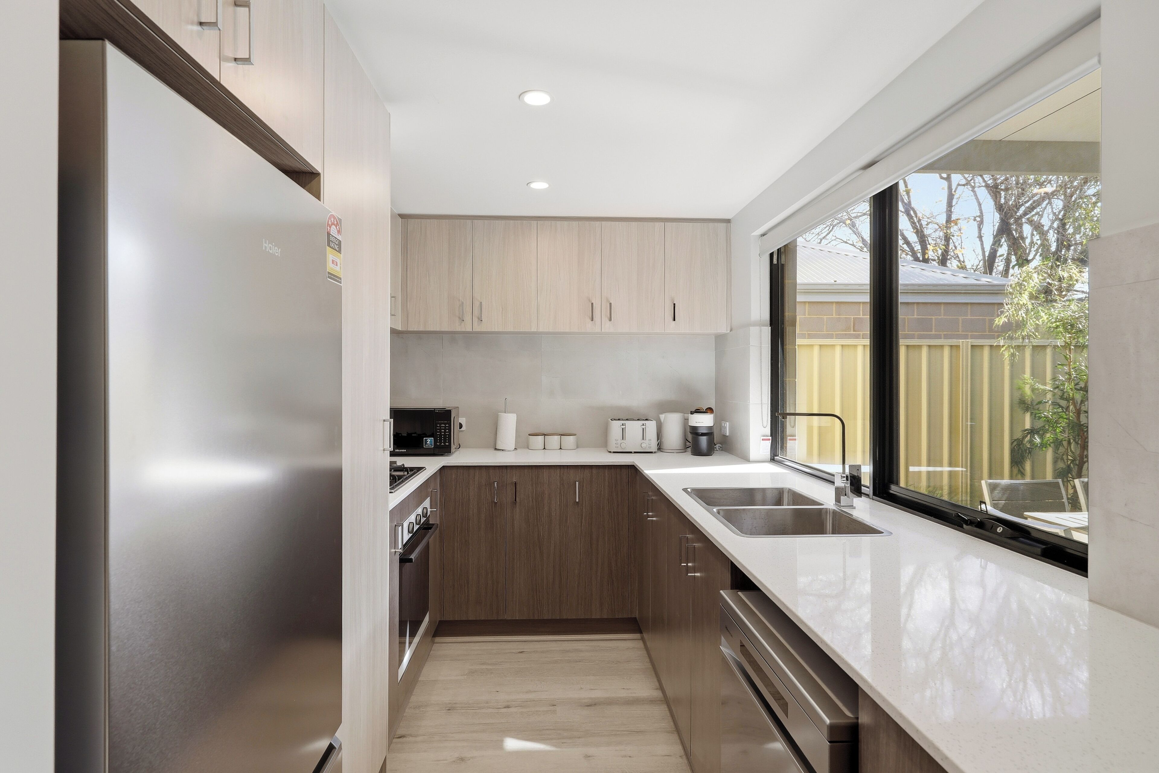 Coffee/tea maker, fridge, microwave, oven