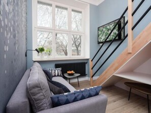 Deluxe-studiosviitti, jokinäköala | Oleskelualue | Tulostin