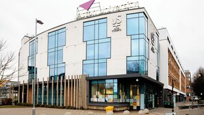 A modern building with a prominent 'Aston University' sign, large windows, and a well-maintained exterior. - Unite - Harriet Martineau - Birmingham (Birmingham)