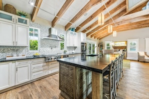 Coffee/tea maker, fridge, microwave, oven - Buddy Beach House by AMI Locals (Holmes Beach)