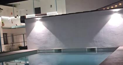 Raízes 22 - 2 Apartment with Shared Pool, Wi-Fi, and Air Conditioning