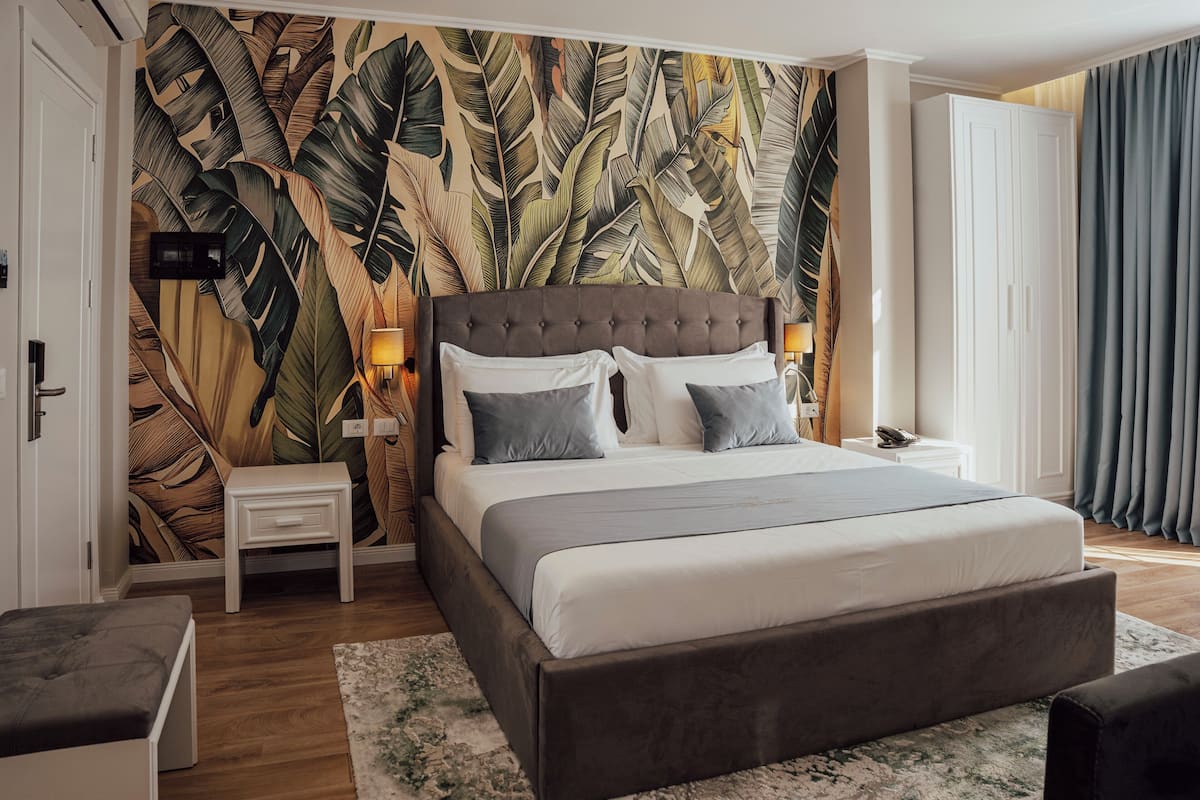 Suite junior, vista al mar | Ropa de cama de alta calidad y camas con efecto memoria 