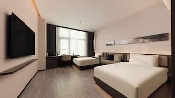 Premium bedding, down comforters, memory foam beds, free minibar