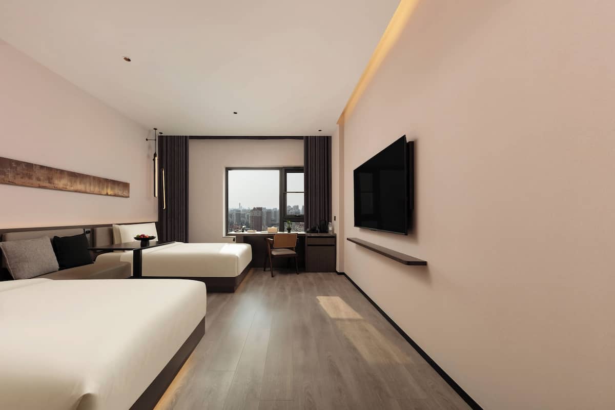 Habitación ejecutiva con 2 camas individuales, vista a la ciudad | Ropa de cama de alta calidad, edredón y camas con efecto memoria