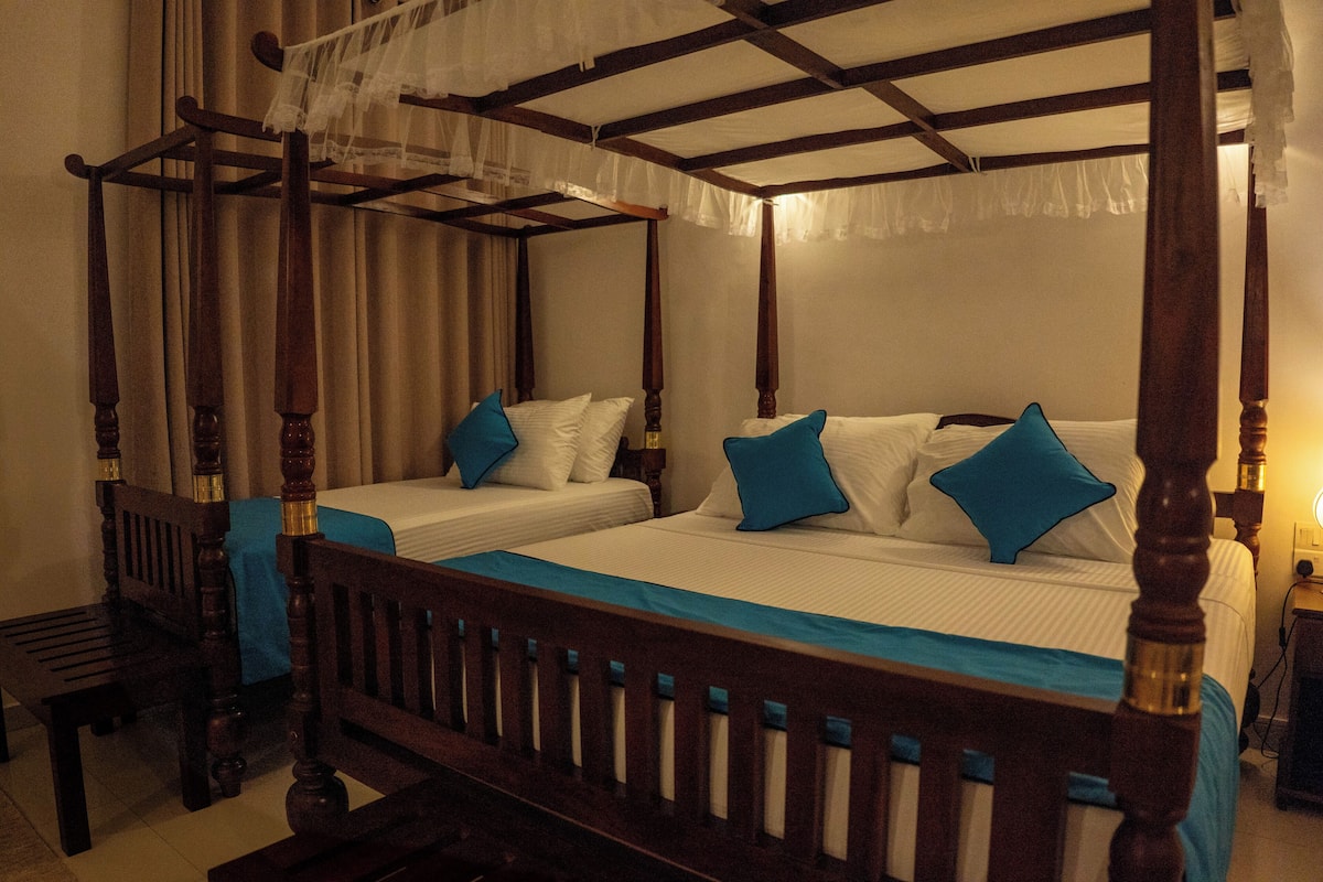 Deluxe Triple Room, Ocean View | Desk, laptop workspace, iron/ironing board (on request), WiFi (free)