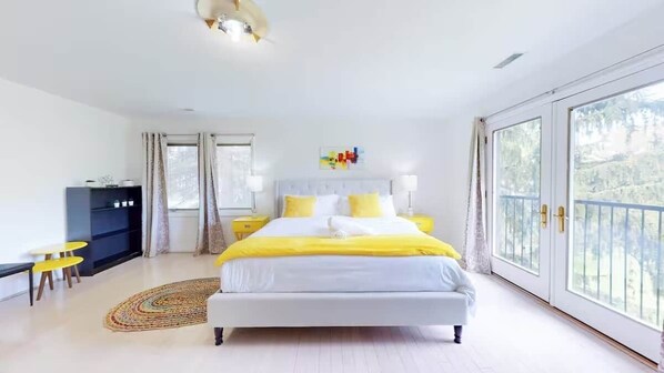 A bedroom with a bed, bedside tables, a desk, and a window with a view. - Tranquil Estate Retreat Pool Pond on 3 Acres (Markham)