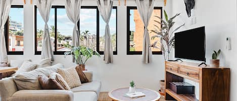 Departamento, vista a la ciudad | Área de sala de estar